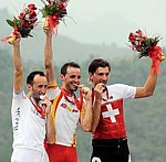 Le podium de la course en ligne aux Jeux Olympiques 2008  Beijing: Rebellin (argent), Sanchez (or), Cancellara (bronze)